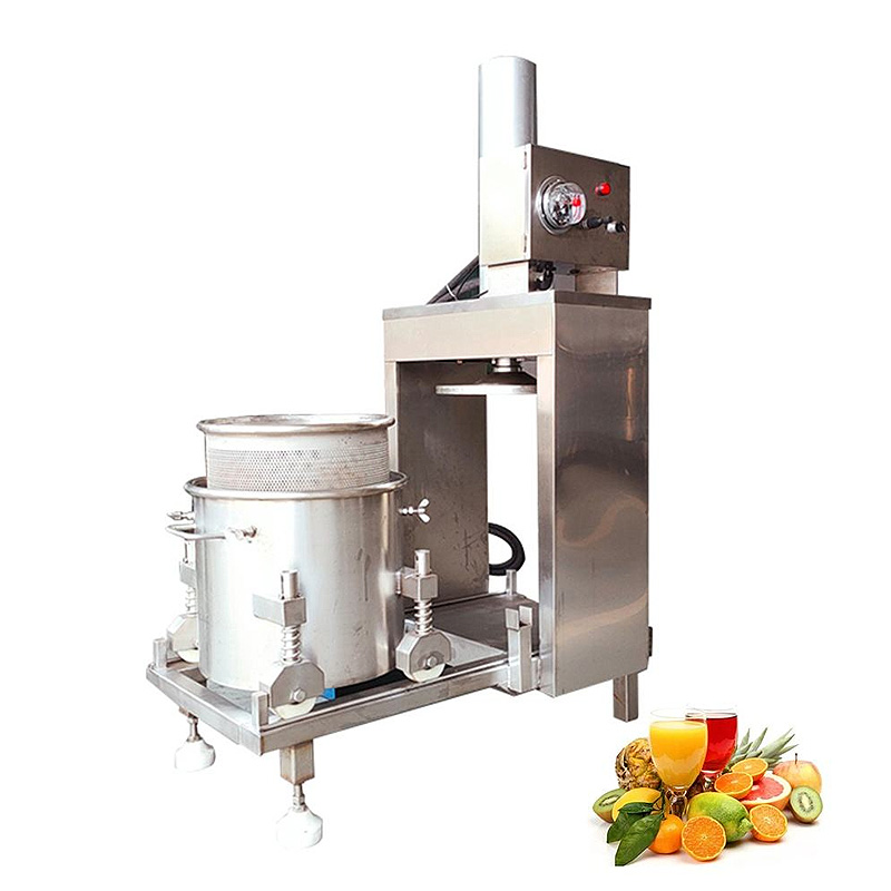 Vista completa della macchina automatica per la spremitura idraulica della frutta.