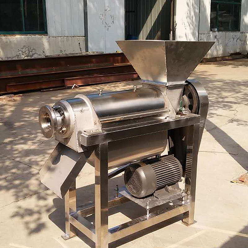 Vista laterale che mette in risalto il sistema di scarico automatico continuo della polpa.