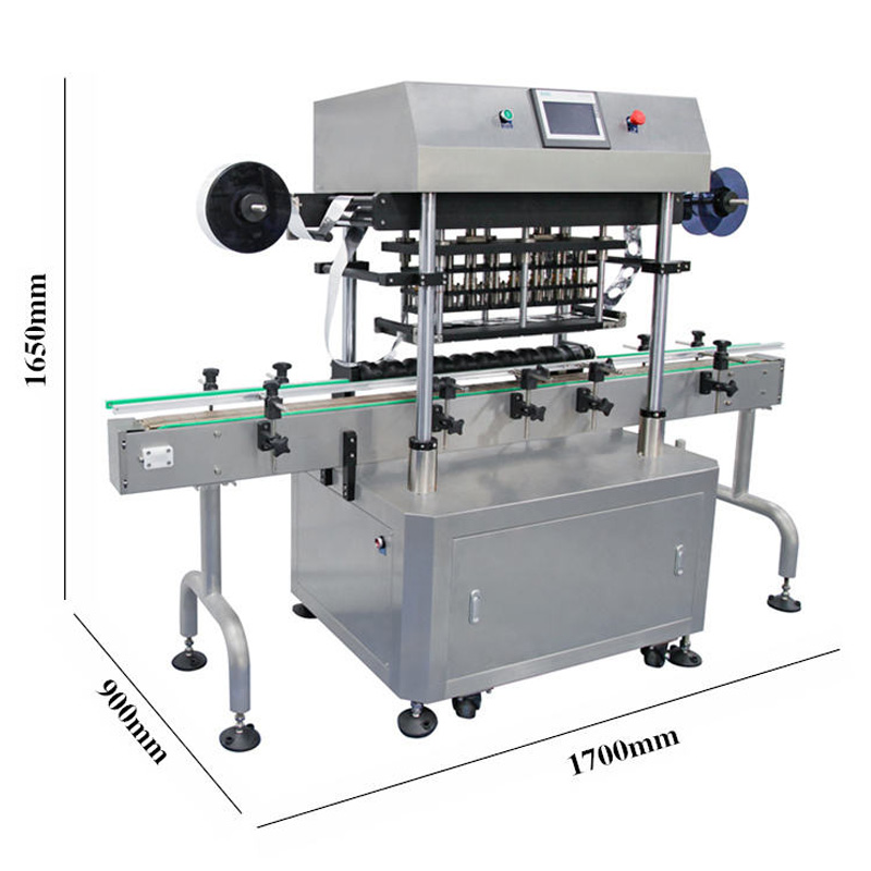 Sealing heads applying heat pressure on bottles