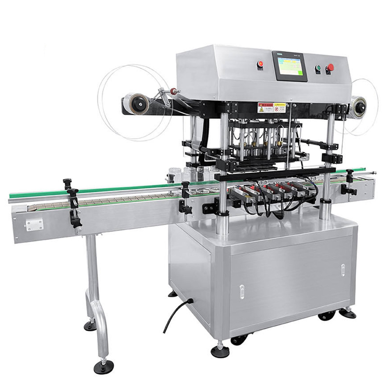 Full view of 4 heads automatic foil capping machine