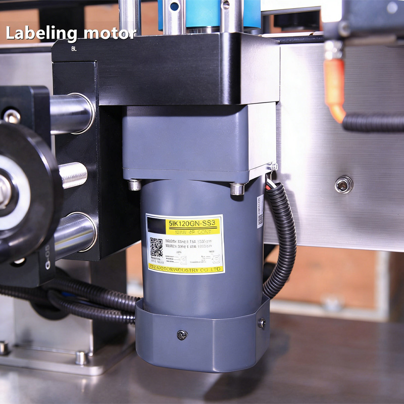 Close-up of labeling head applying labels precisely