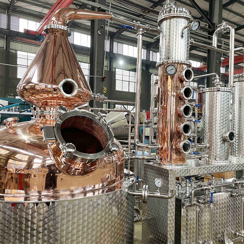 Copper still head and distillation column detail view of multifunctional distillery system