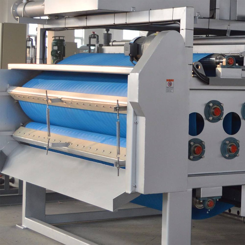 Belt filter press for gravity thickening and sludge dewatering