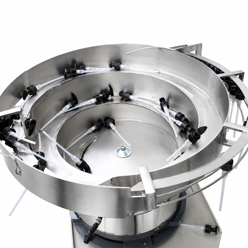 Vibratory bowl sorter for automatic cosmetic bottle cap feeding system