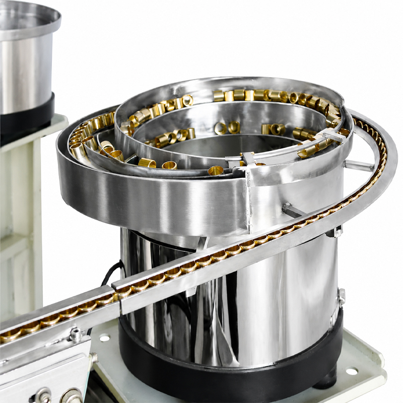 Vibratory bowl feeder for automatic perfume bottle cap and collar ring feeding system