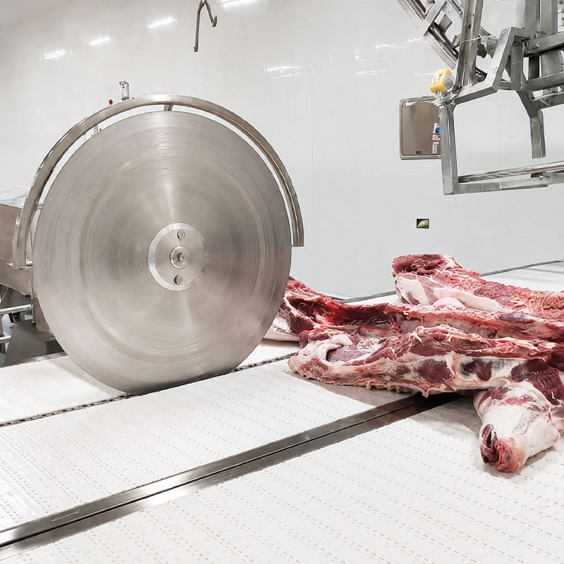 Industrial meat cutting equipment for food processing plant