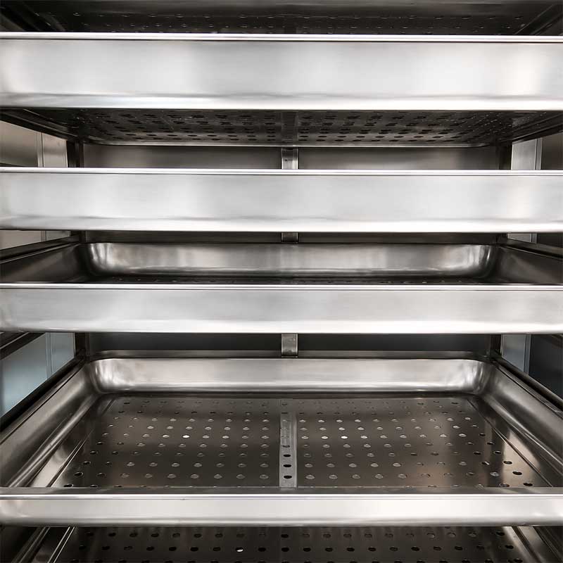 Multi layer tray rack inside industrial steam cabinet Multi layer tray rack inside industrial steam cabinet