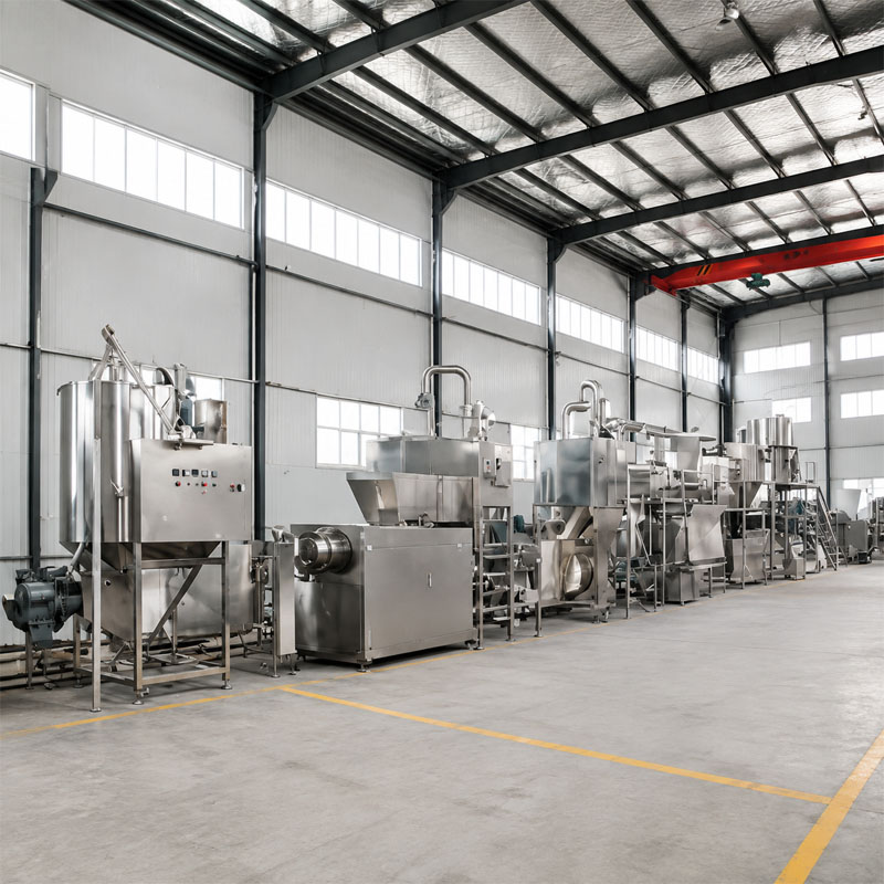 Industrial puffed snack manufacturing line with extrusion equipment