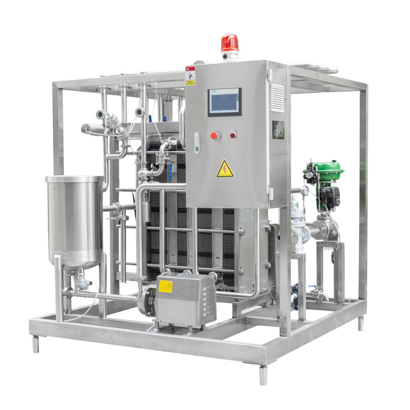 Plate type cream pasteurizer operating in industrial dairy processing plant
