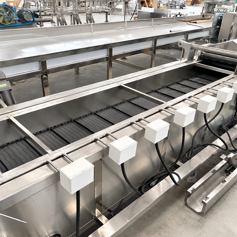 Stainless steel conveyor belt inside a continuous frying machine Stainless steel conveyor belt inside a continuous frying machine